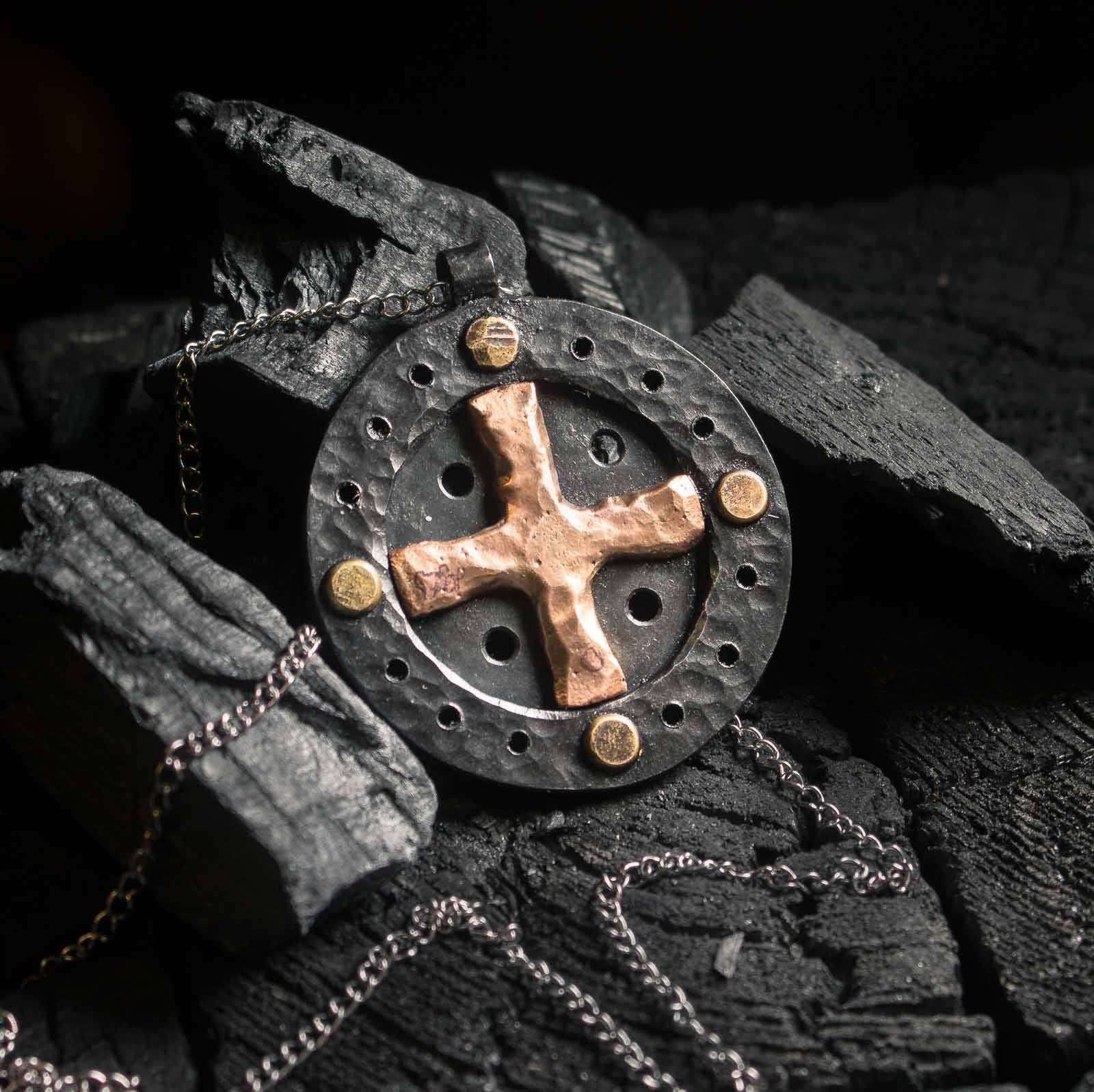 sun cross necklace in iron and bronze