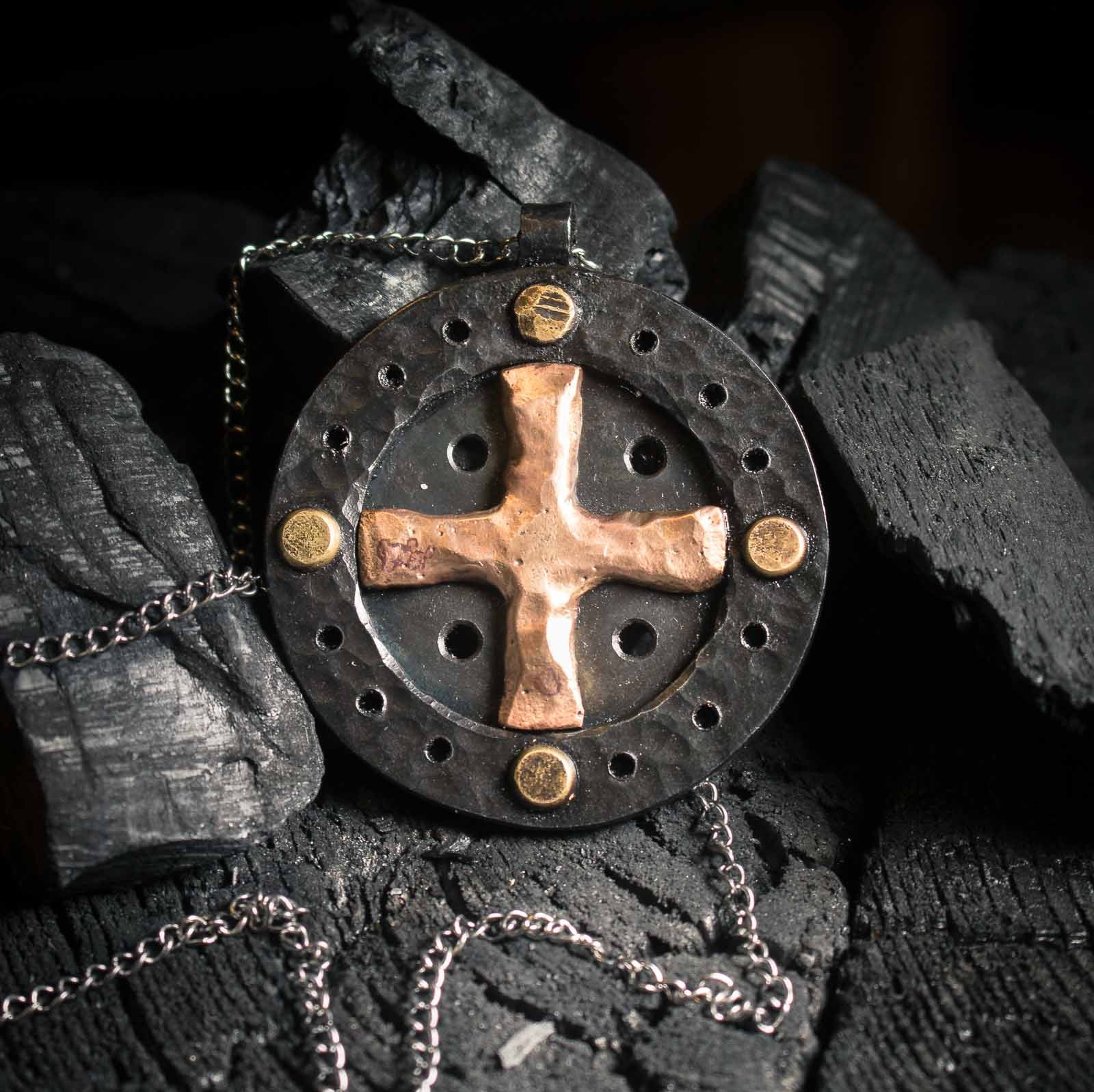 Handmade sun cross necklace in iron and bronze