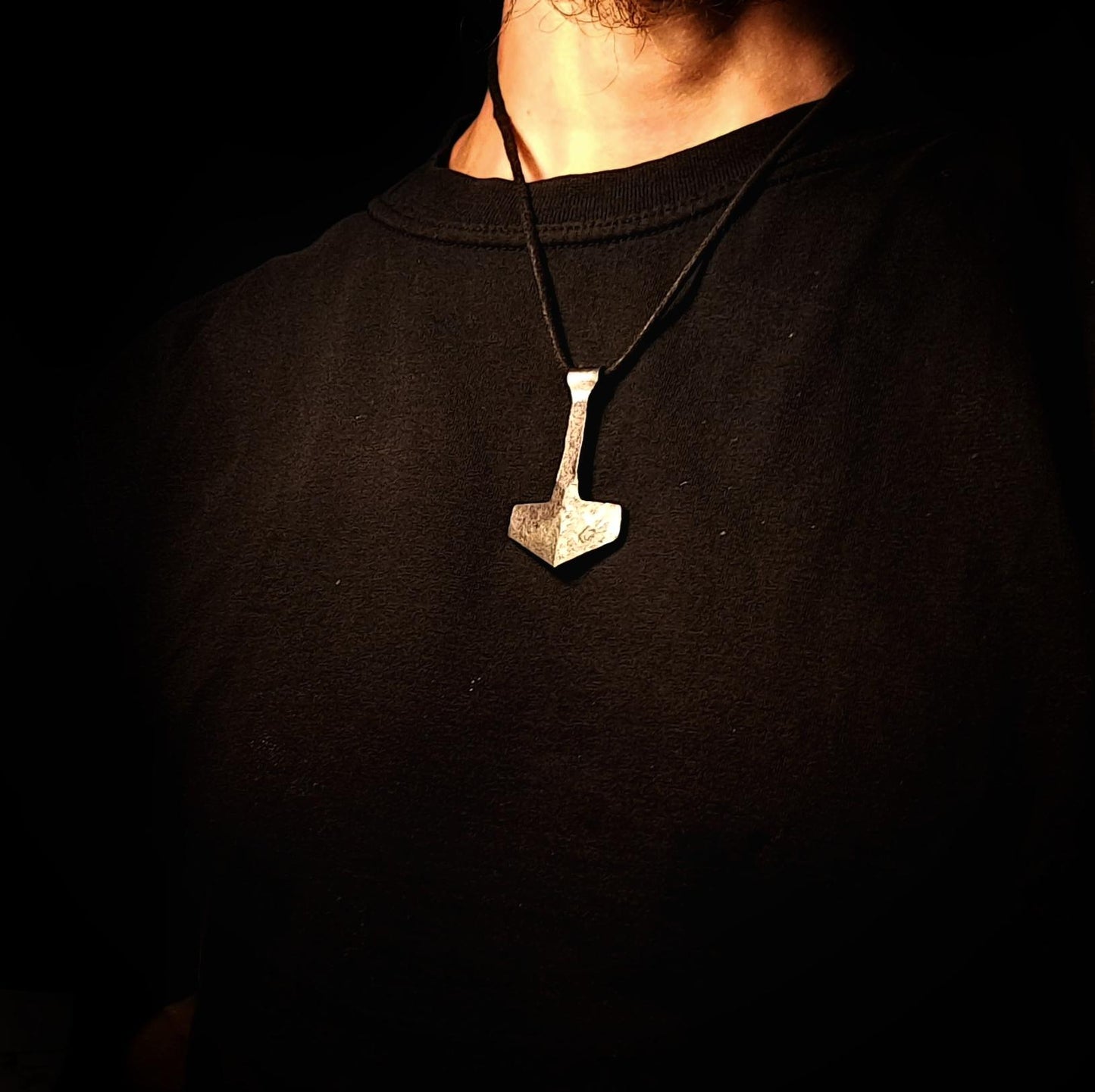 model wearing thors hammer pendant