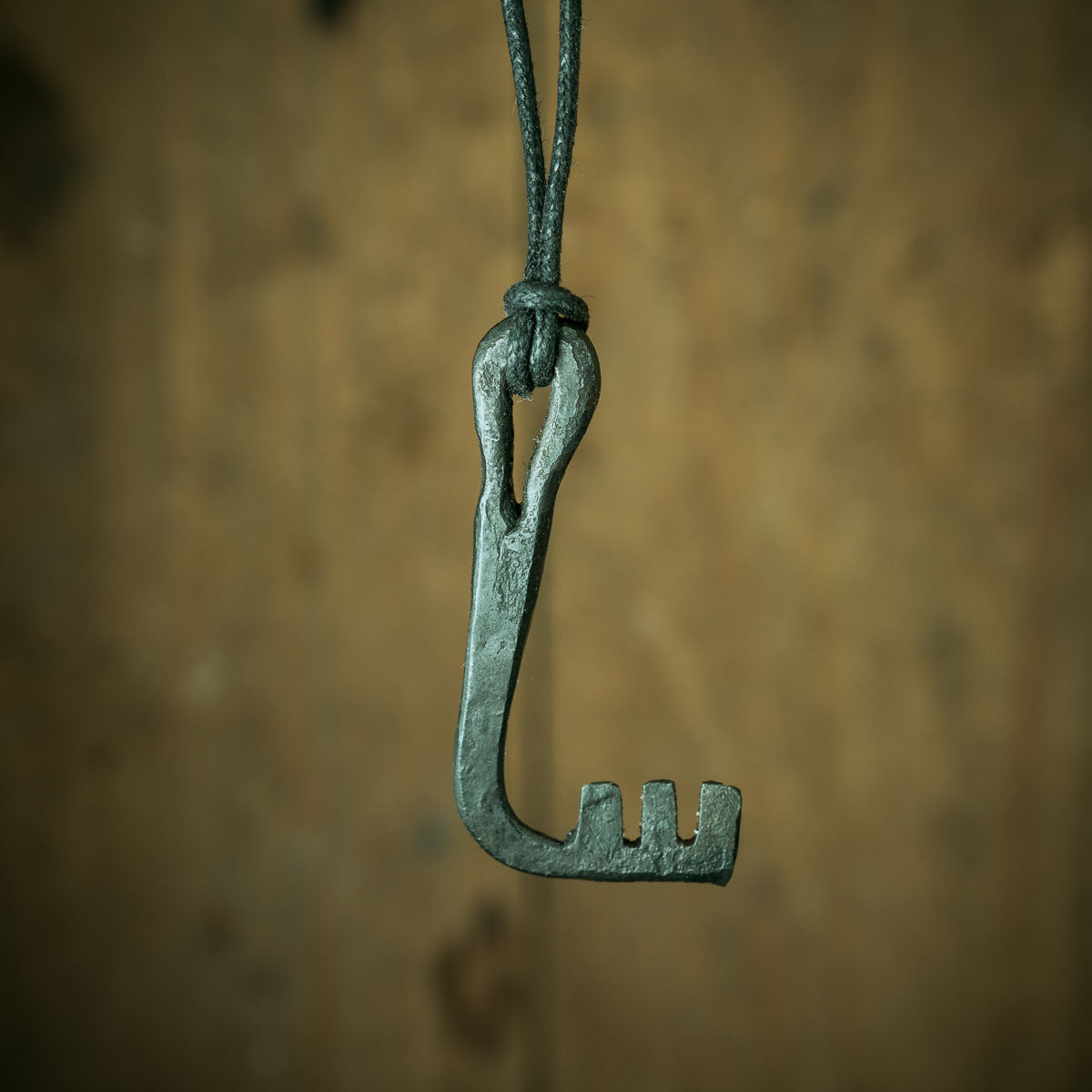 blacksmith making a viking era key and viking lock