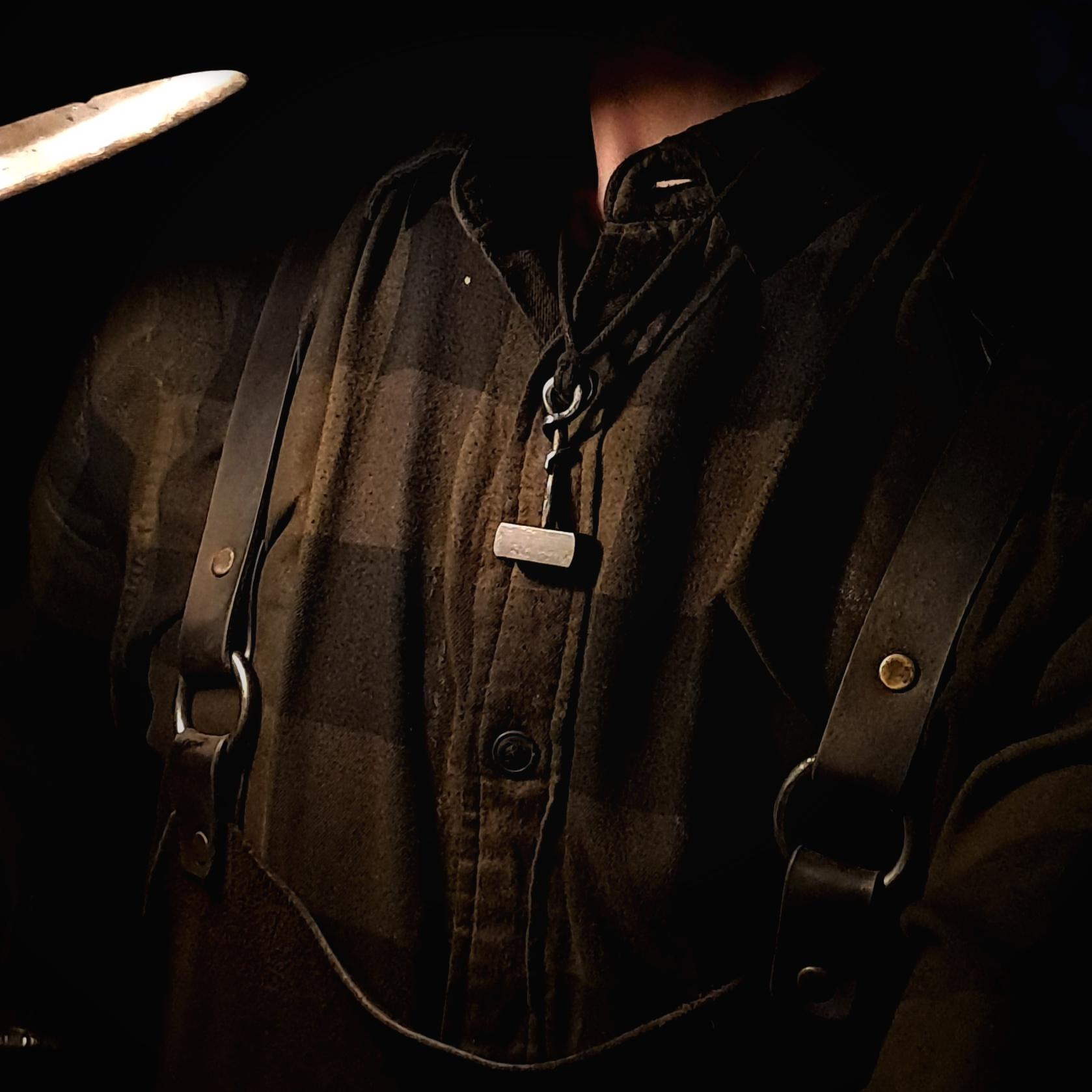 model with hand forged thors hammer mjolnir