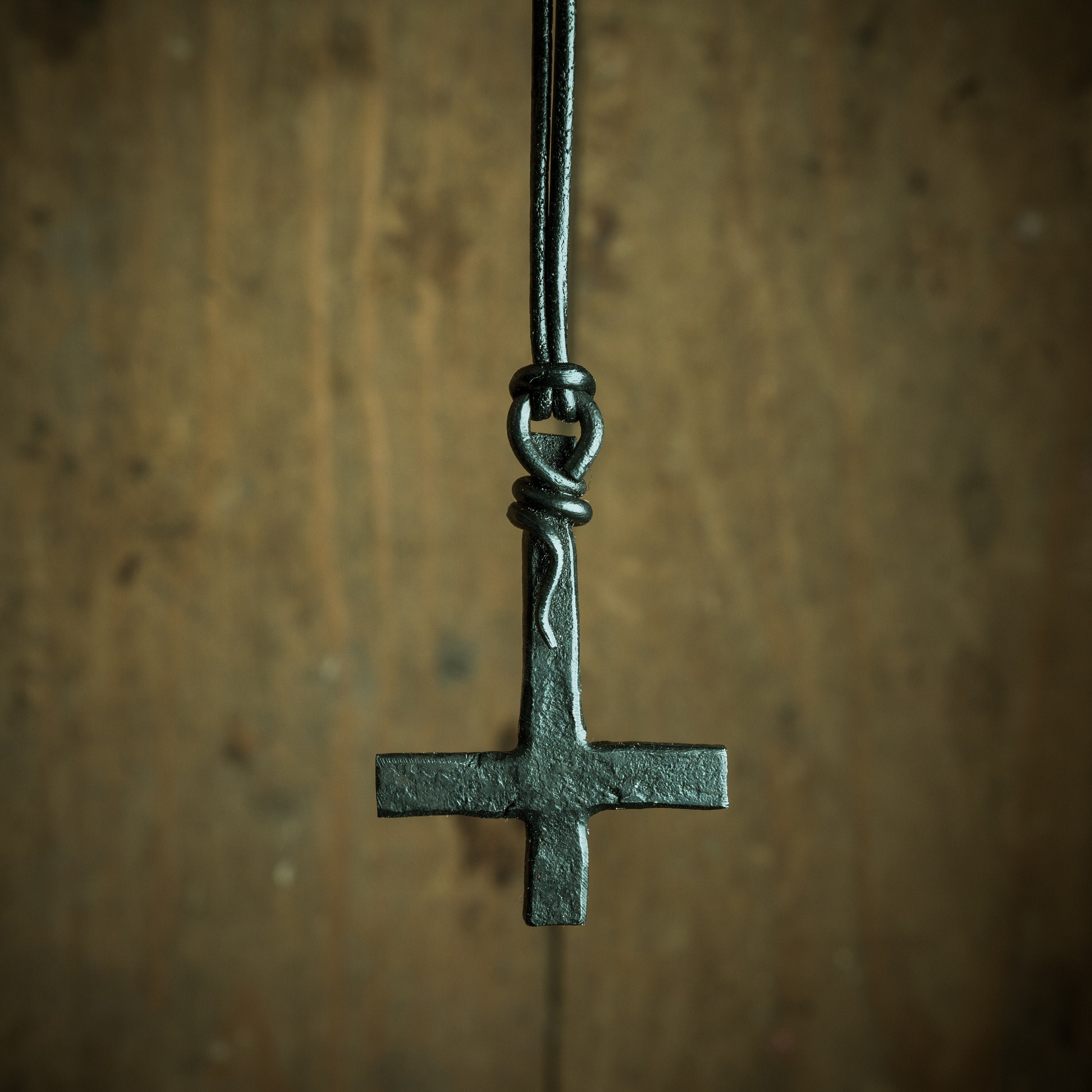 Inverted cross pendant